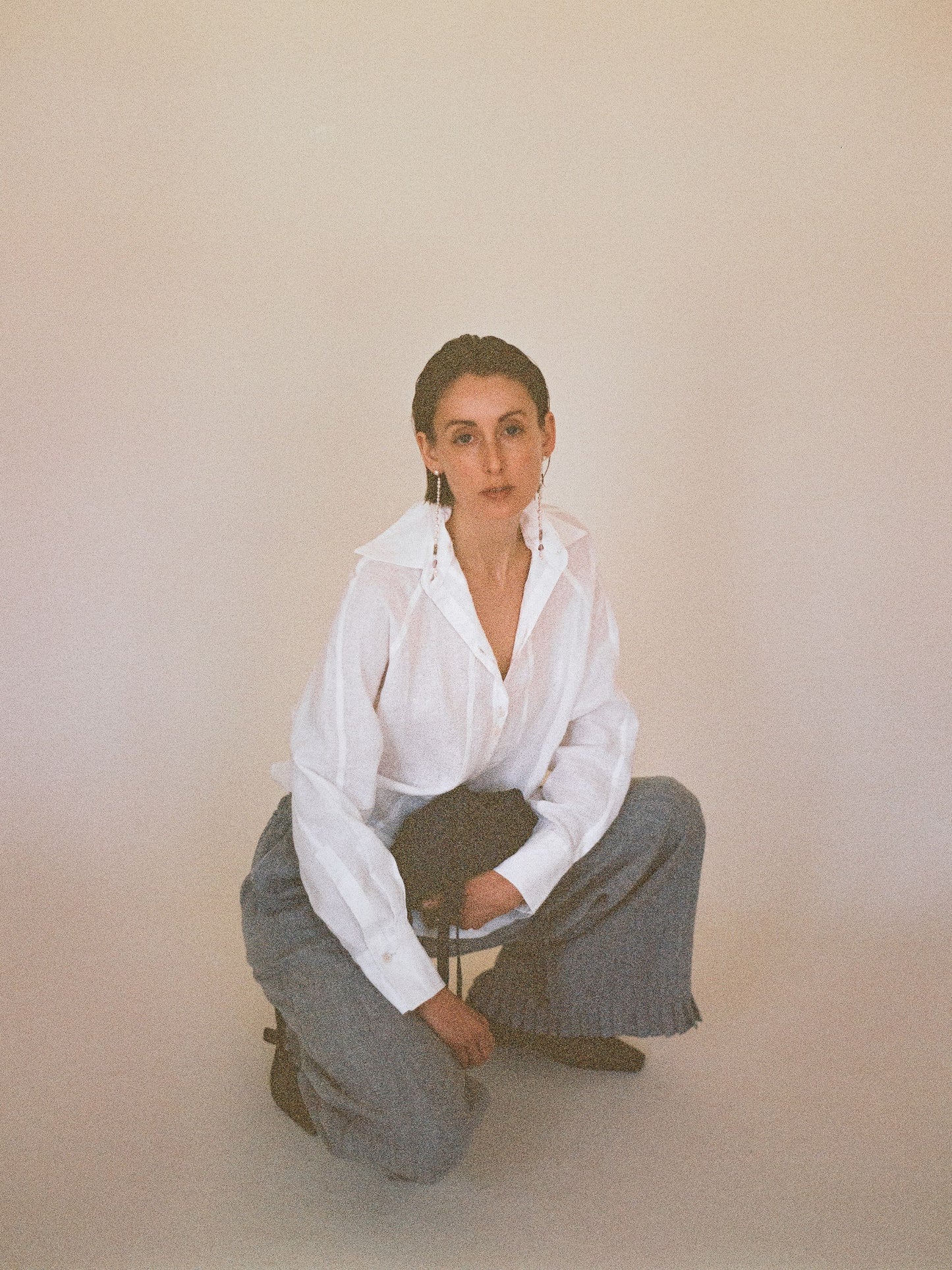 Atelier Magata Ivory white linen shirt with side slit and blue hemp ruffle trousers