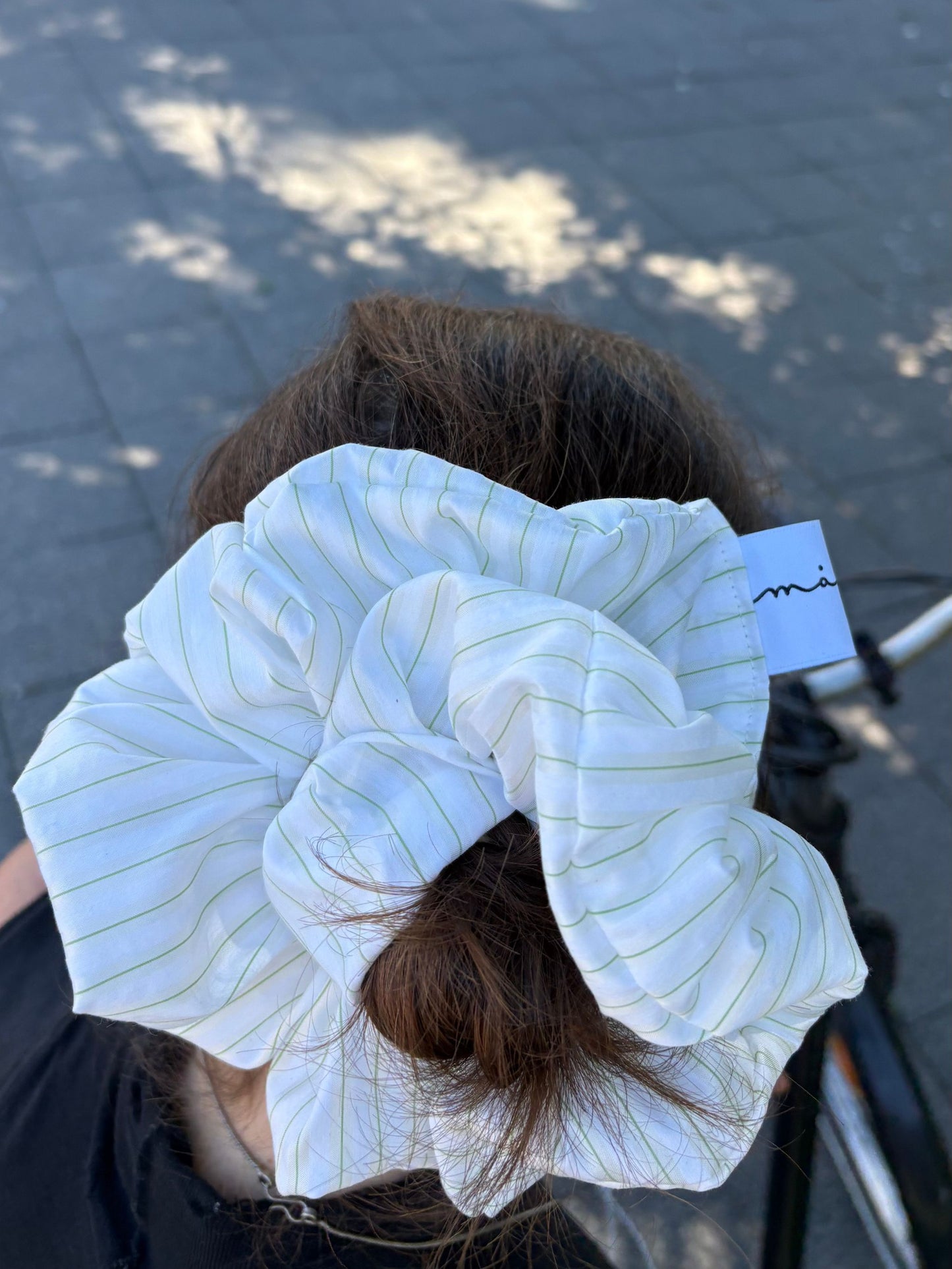 Magata Puff striped scrunchie on hair