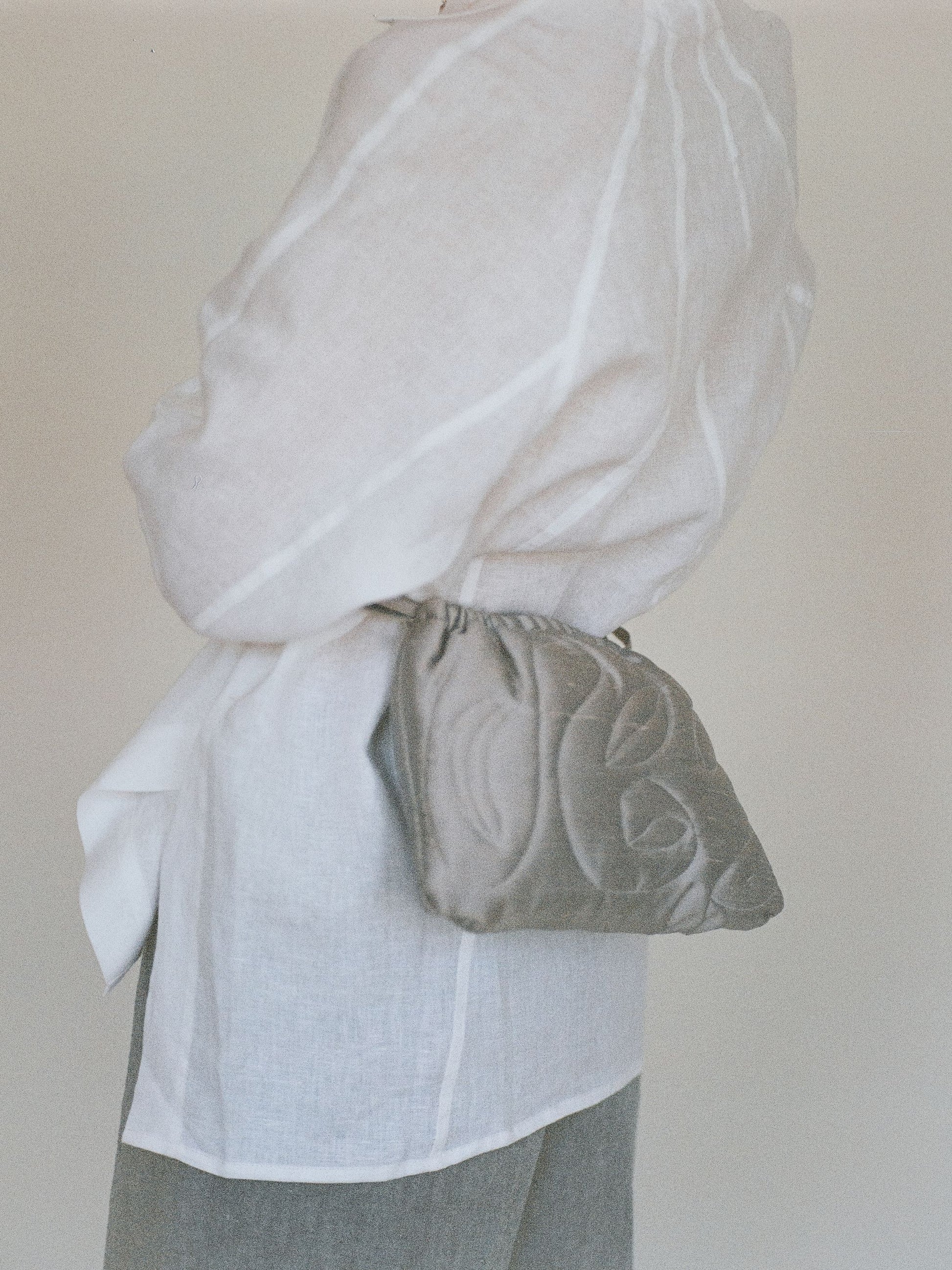 Atelier Magata Ivory white linen shirt with side slit and beaded belt and silver pouch beg belt