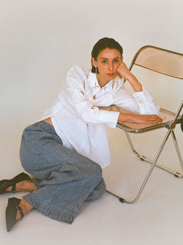 Atelier Magata Tide Linen Trousers Blue White linen shirt black mesh Mary Jane Plia Chair